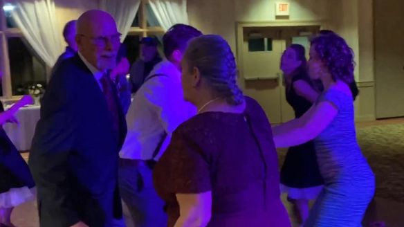 Older couple dancing.
